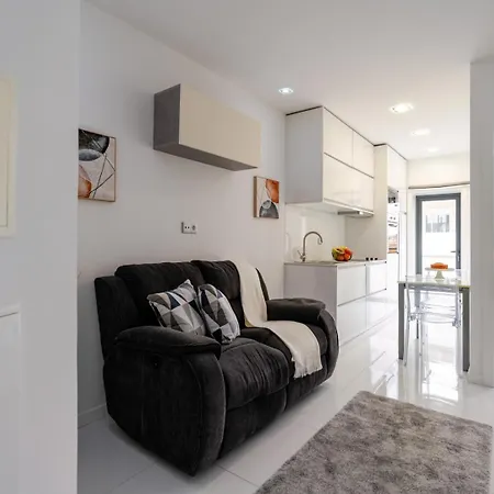 Sleek With Balcony By Hostwise Apartament